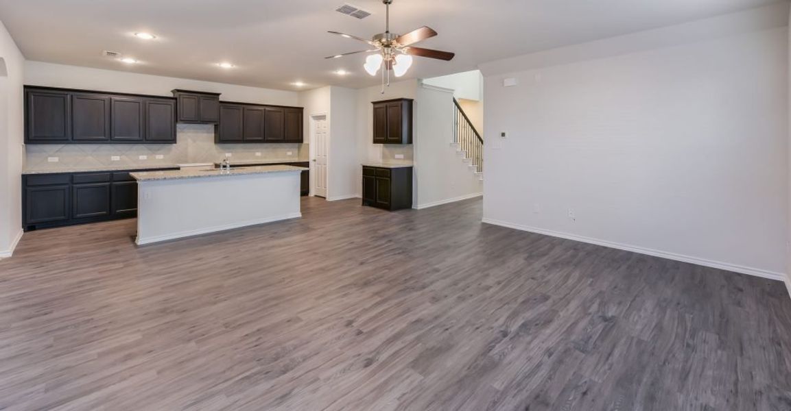 Representative exterior photo of a completed home built from the Adina by Impression Homes in Heartland, Heartland, TX (Image 11). Representative exterior photo of a completed home built from the Adina by Impression Homes in Heartland, Heartland, TX (Image 11).