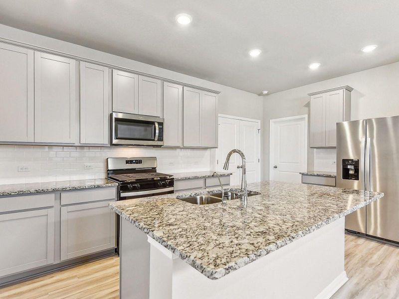 Photo is not of the actual home, but is an inspirational photo of builder’s model home and may depict options, furnishings, and/or decorator features that are not included