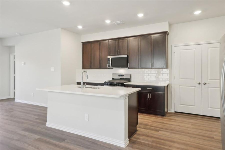 Photo is not of the actual home, but is an inspirational photo of builder’s model home and may depict options, furnishings, and/or decorator features that are not included.