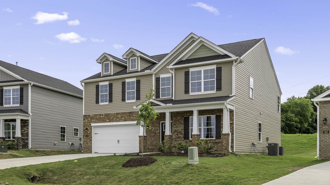 Front exterior of a new home in Bryson Park, Lexington, NC, highlighting curb appeal (Image 2). Front exterior of a new home in Bryson Park, Lexington, NC, highlighting curb appeal (Image 2).