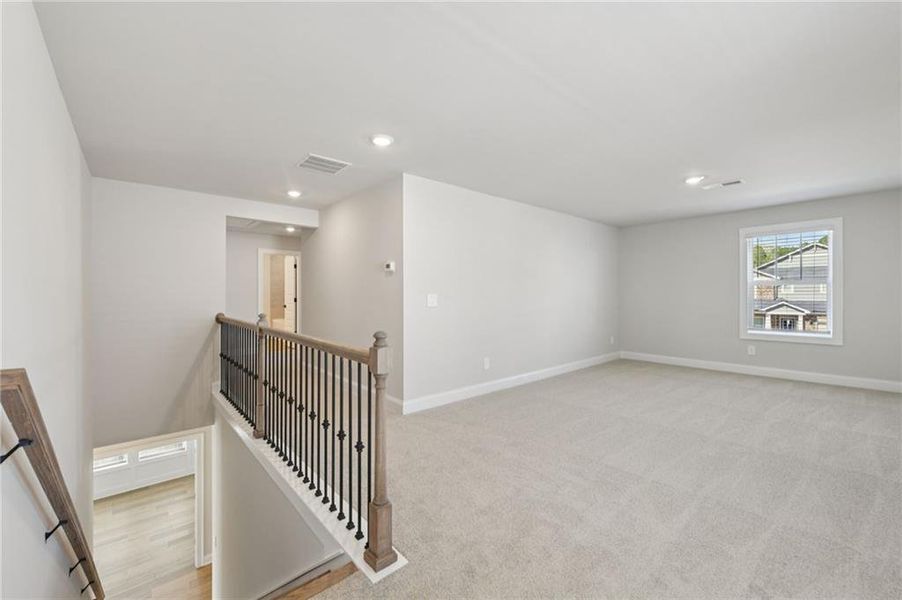 Spacious, unfurnished interior of a new home in Vines at Mill Creek - Estate Series, Braselton (Image 47).