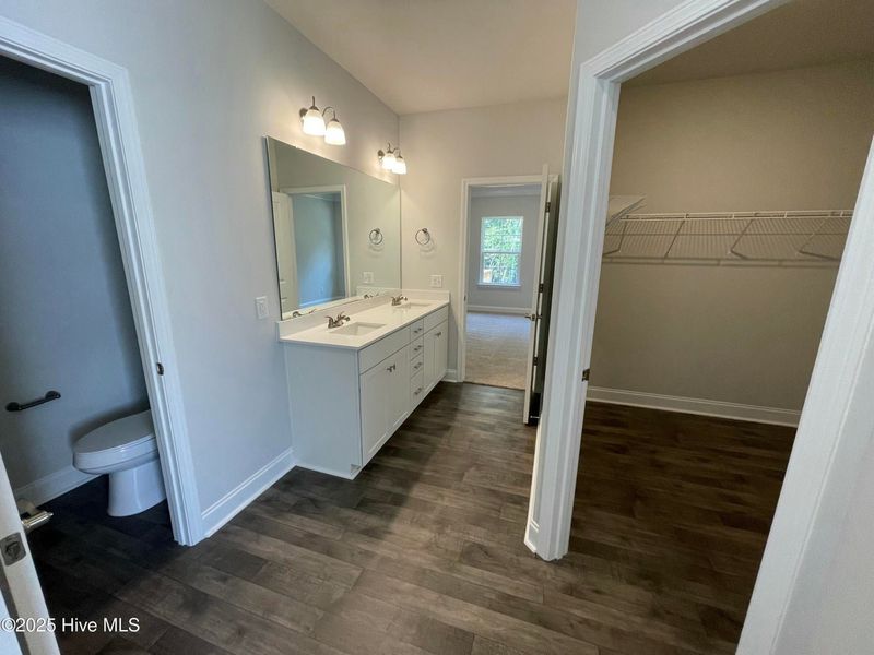 Furnished interior view inside a new home in Mill Creek Cove, Bolivia (Image 11).