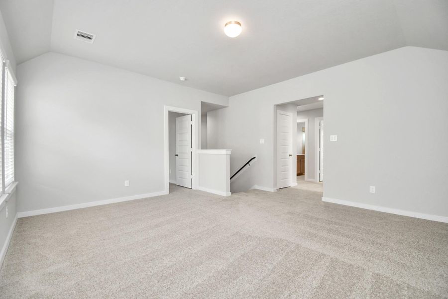 Take another look at this beautiful and spacious loft area, perfect for a game room!