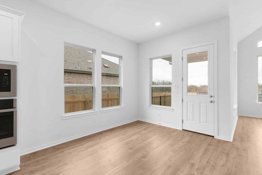 Spacious, unfurnished interior of a new home in Carillon, Manor (Image 21).