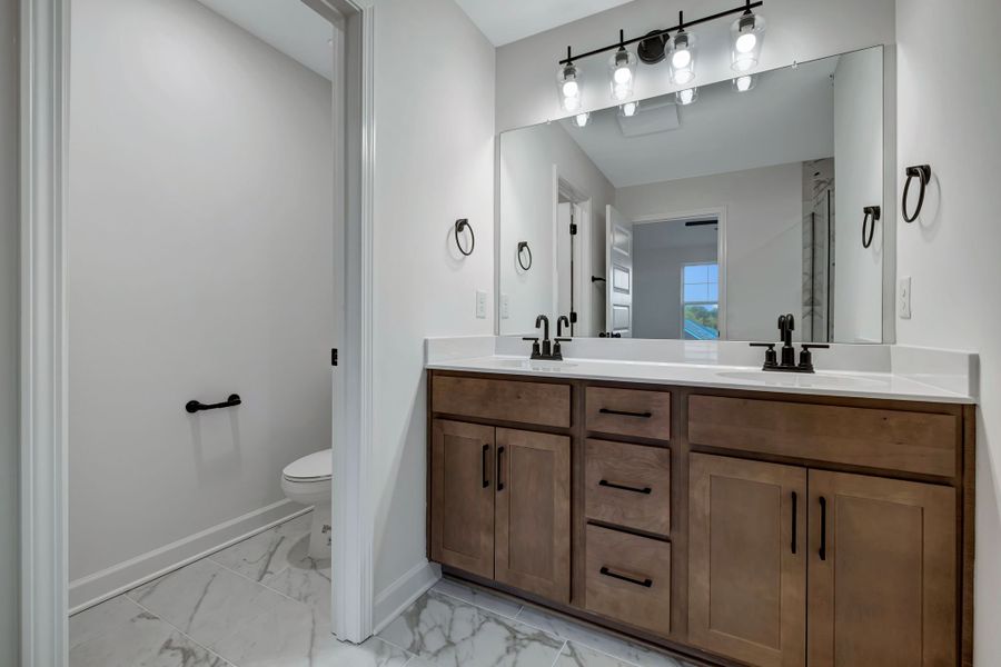 Representative furnished interior of a home built from the Ingram Rowhome by Parkside Builders in Anderson Park, Hendersonville (Image 39).