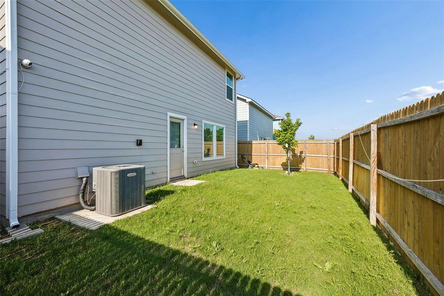 Exterior details and patio area of a home in Trinity West, Dallas (Image 3).