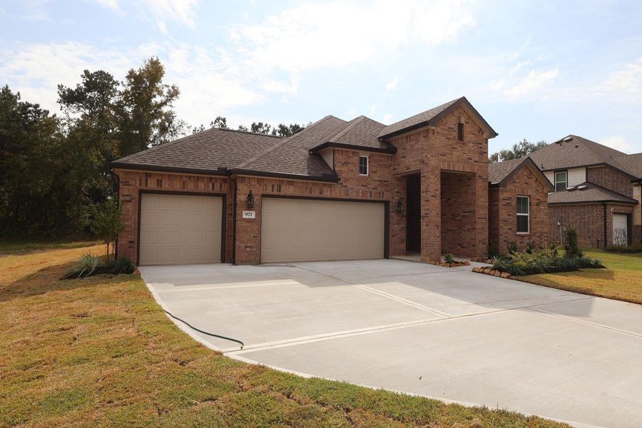 One story home with 3 beds, 2.5 baths, and 3 car garage
