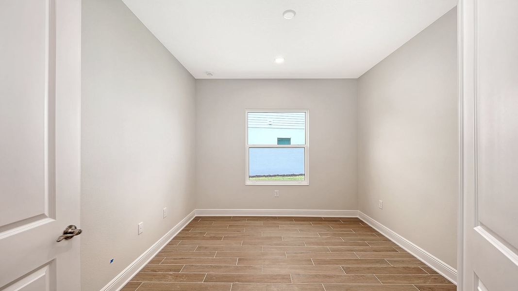 Spacious, unfurnished interior of a new home in Grand Park Real Estate and Homes for Sale in Sarasota, FL - Neal Communities, Sarasota (Image 43).