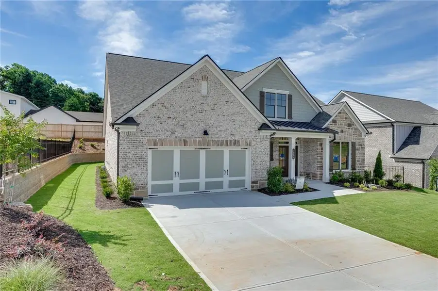 Front exterior of a new home in , Buford, GA, highlighting curb appeal (Image 2). Front exterior of a new home in , Buford, GA, highlighting curb appeal (Image 2).