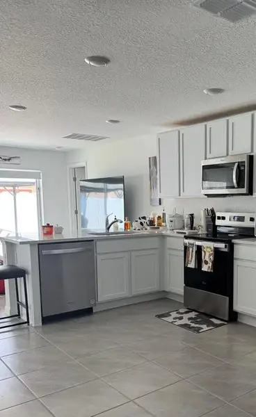 Furnished interior view inside a new home in , Ocala (Image 11).