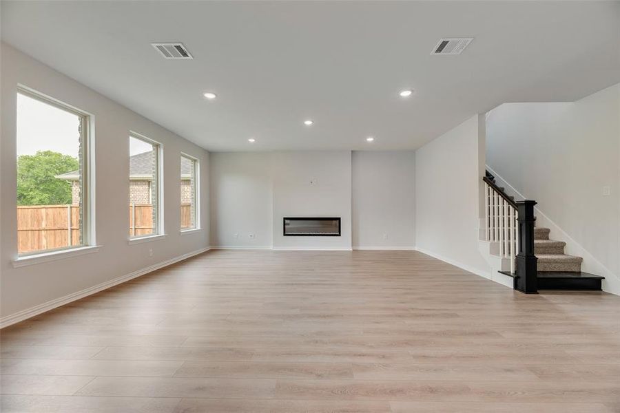 Spacious, unfurnished interior of a new home in Valencia On The Lake, Little Elm (Image 32). Spacious, unfurnished interior of a new home in Valencia On The Lake, Little Elm (Image 32).