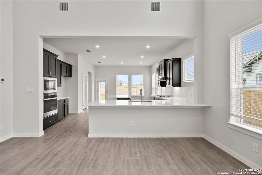 Spacious, unfurnished interior of a new home in Village at Three Oaks, Seguin (Image 9). Spacious, unfurnished interior of a new home in Village at Three Oaks, Seguin (Image 9).