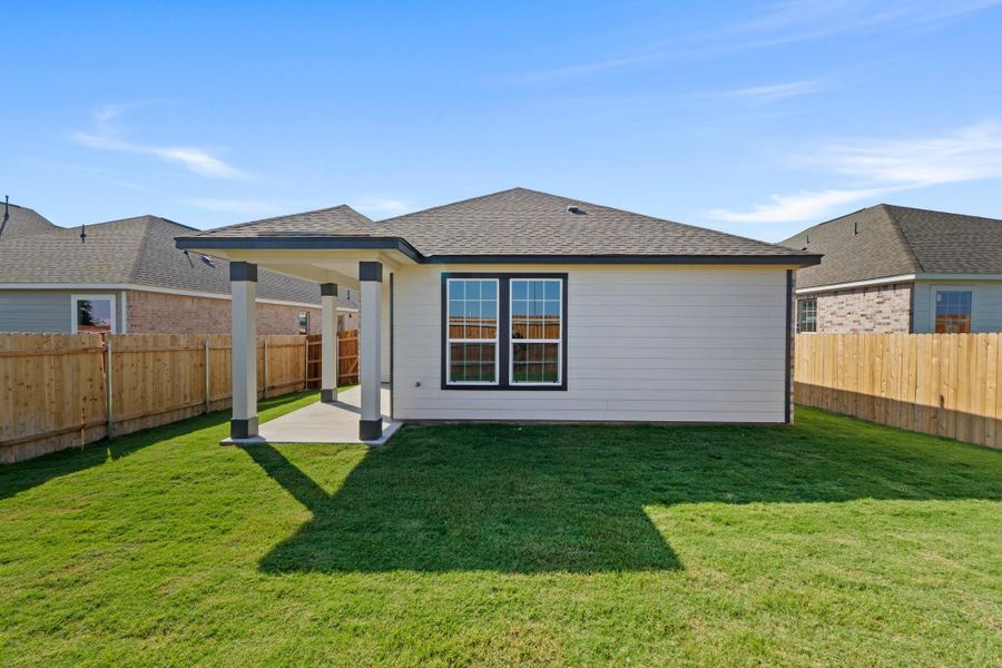 Front exterior of a new home in Salerno - Heritage Collection, Round Rock, TX, highlighting curb appeal (Image 1). Front exterior of a new home in Salerno - Heritage Collection, Round Rock, TX, highlighting curb appeal (Image 1).