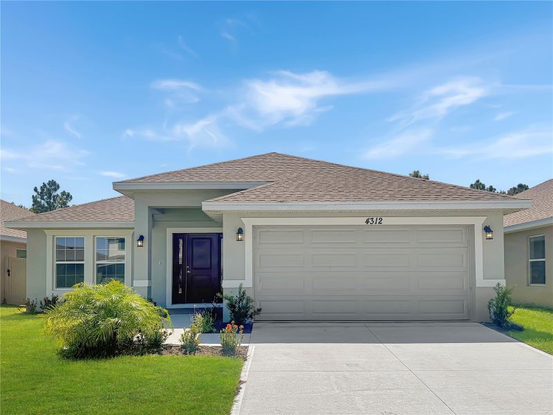 Front exterior of a new home in Harmony Central, Harmony, FL, highlighting curb appeal (Image 1). Front exterior of a new home in Harmony Central, Harmony, FL, highlighting curb appeal (Image 1).
