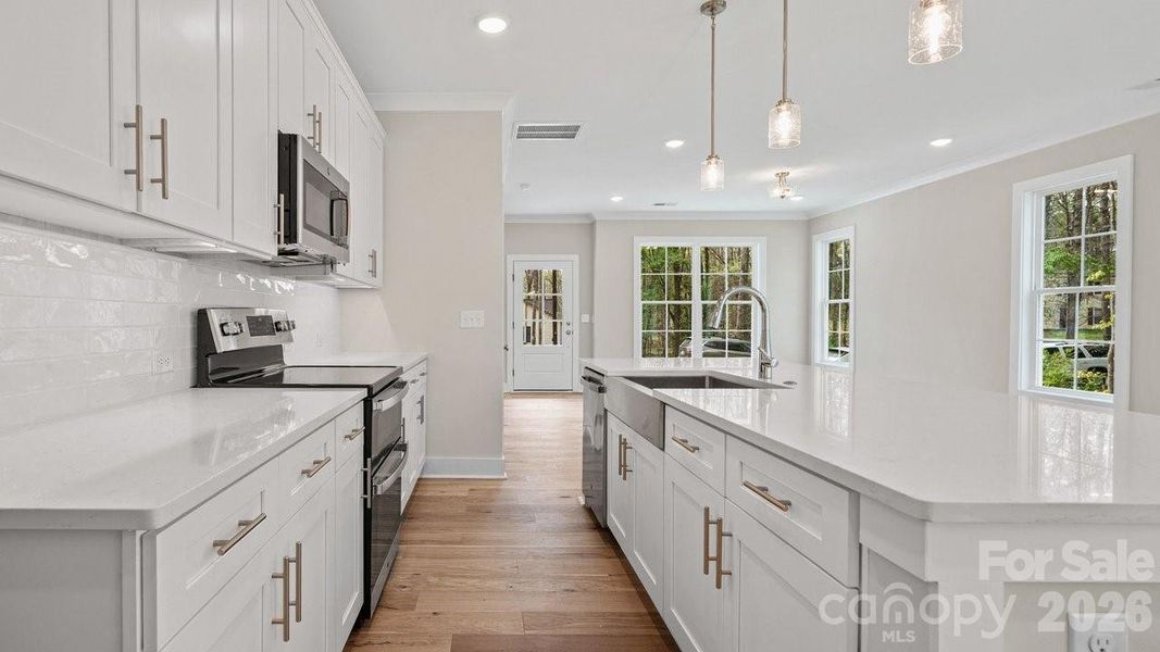 Furnished interior view inside a new home in , Waxhaw (Image 7).