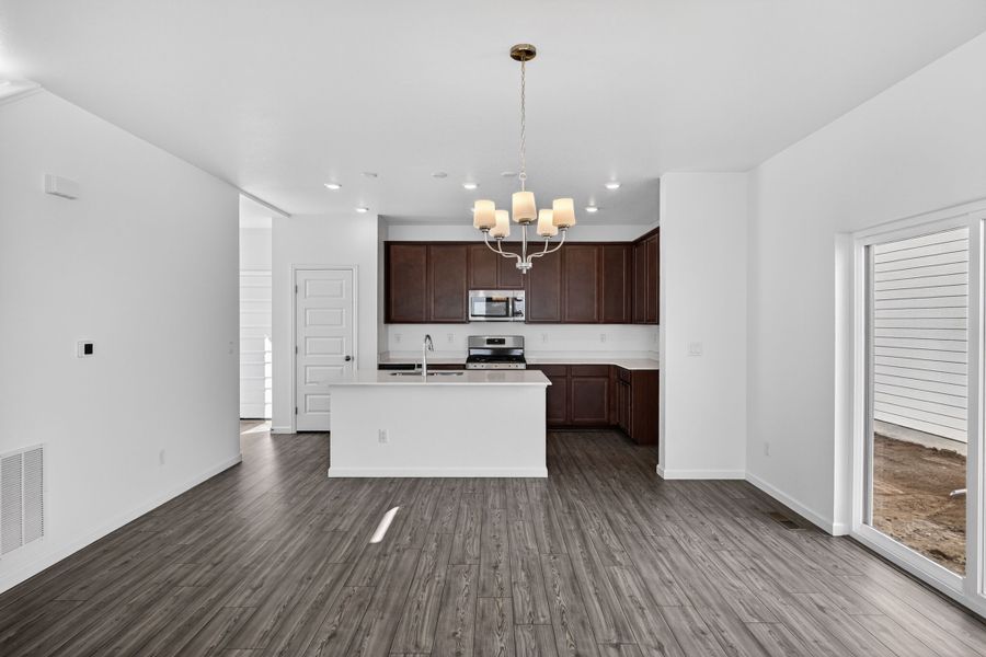 Furnished interior view inside a new home in Sky Ranch, Aurora (Image 3).