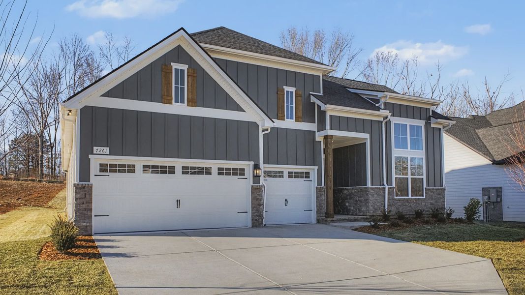 Front exterior of a new home in Richvale Estates, Fairview, TN, highlighting curb appeal (Image 20). Front exterior of a new home in Richvale Estates, Fairview, TN, highlighting curb appeal (Image 20).