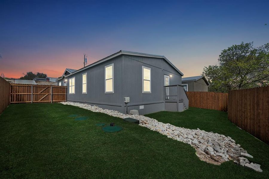Exterior details and patio area of a home in , Granbury (Image 21).