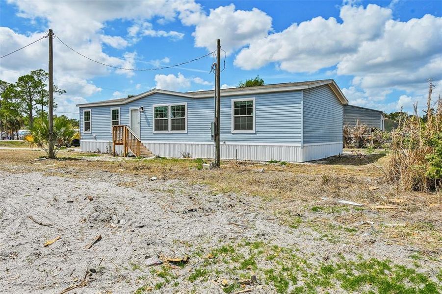 Exterior details and patio area of a home in , North Fort Myers (Image 22).
