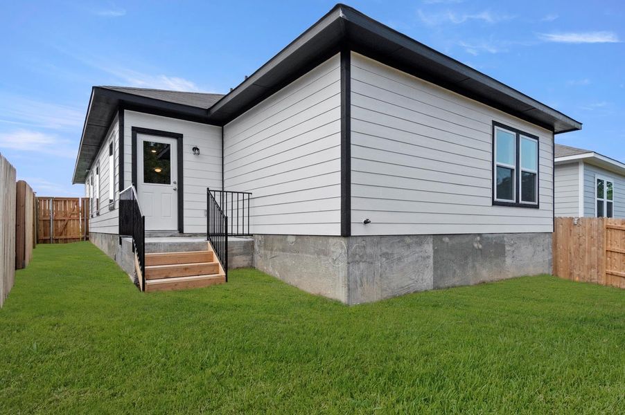 Exterior details and patio area of a home in Cloverleaf, Austin (Image 3).