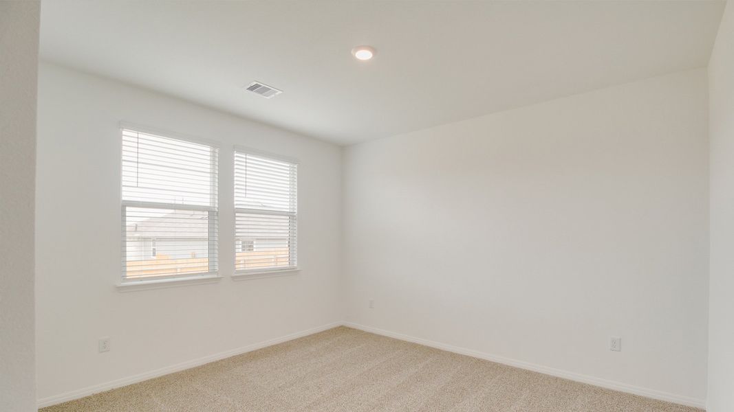 Representative unfurnished interior of a home built from the The Abbot by D.R. Horton in Talavera, Kyle (Image 8).