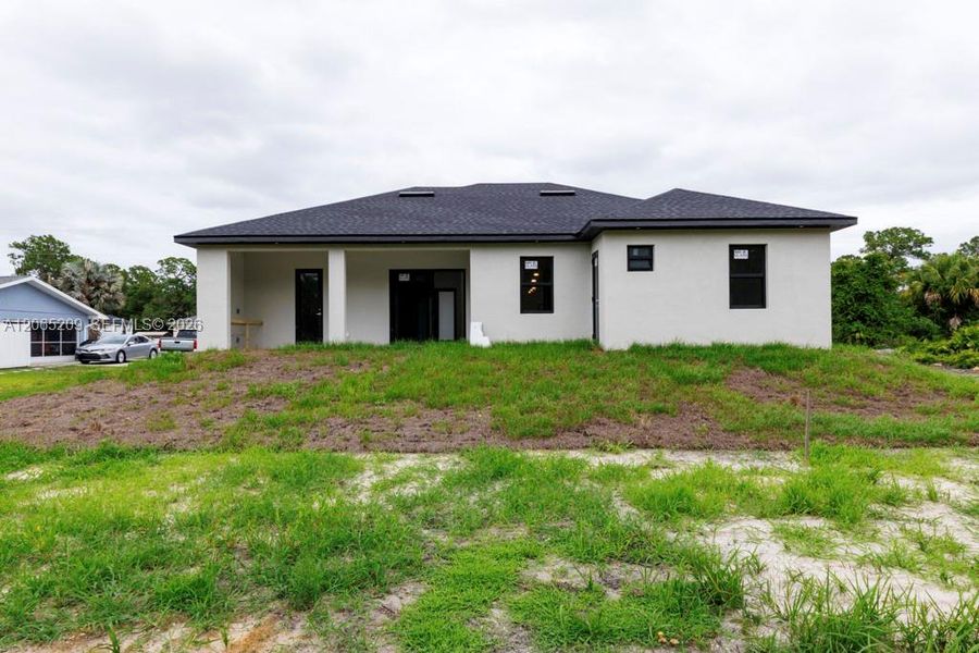 Exterior details and patio area of a home in , Lehigh Acres (Image 38).