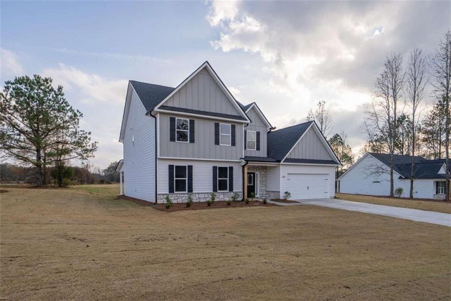 Front exterior of a new home in , Good Hope, GA, highlighting curb appeal (Image 3).