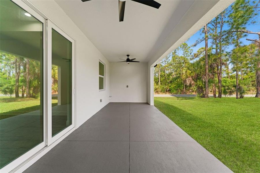 Exterior details and patio area of a home in , North Port (Image 24).