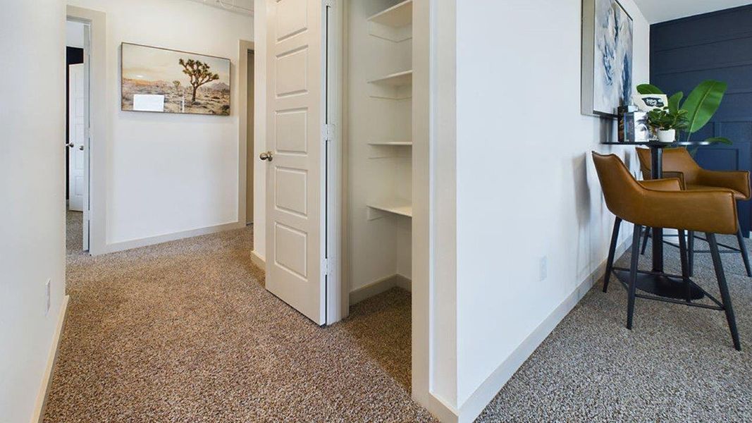 Representative furnished interior of a home built from the The Pierce by D.R. Horton in Overlook West, Wolfforth (Image 23).