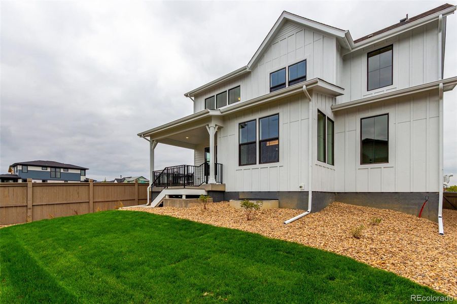 Exterior details and patio area of a home in West Grange, Longmont (Image 1).