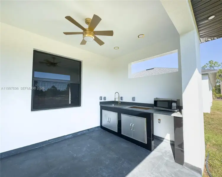 Exterior details and patio area of a home in , Lehigh Acres (Image 14). Exterior details and patio area of a home in , Lehigh Acres (Image 14).