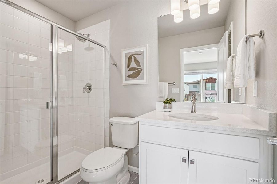 Furnished interior view inside a new home in Woodrose at Painted Prairie, Aurora (Image 26).