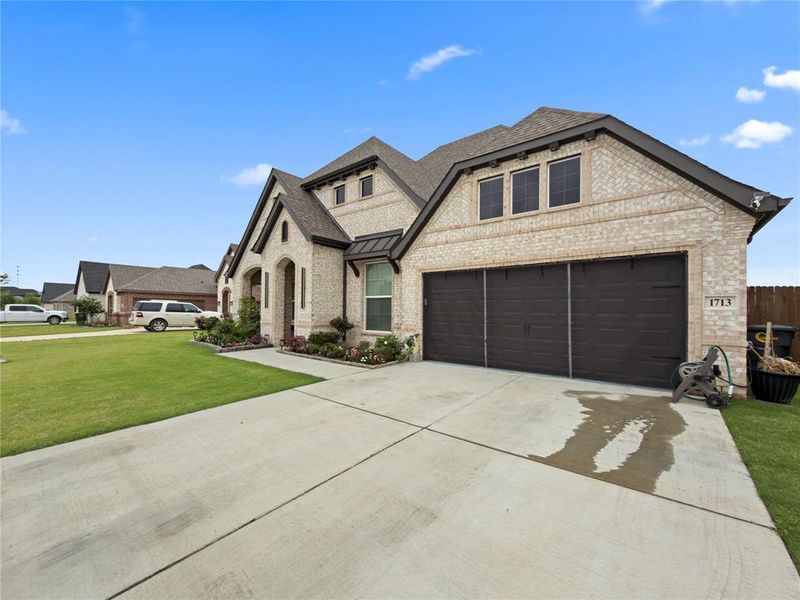 Front exterior of a new home in Belle Meadows, Cleburne, TX, highlighting curb appeal (Image 25).