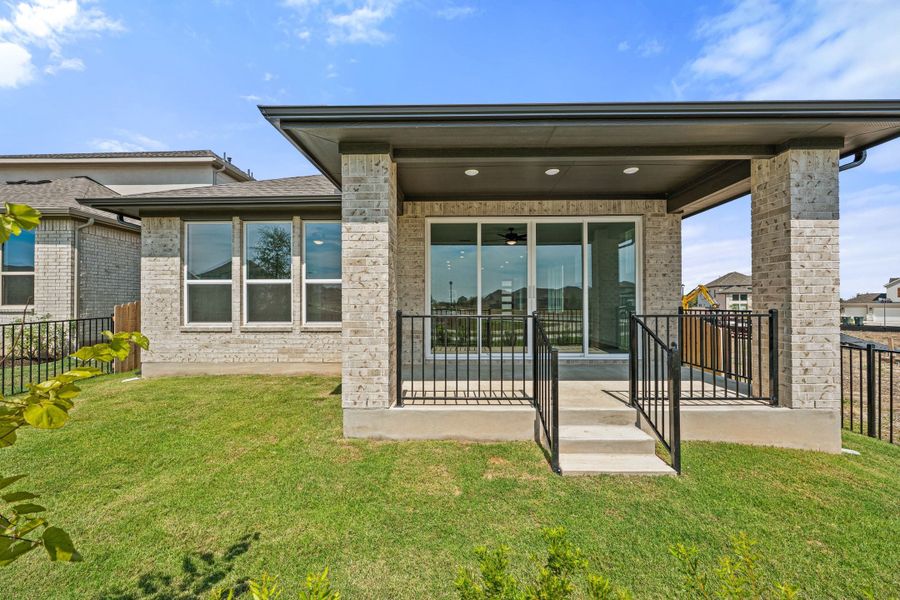Exterior details and patio area of a home in Flora, Hutto (Image 27).
