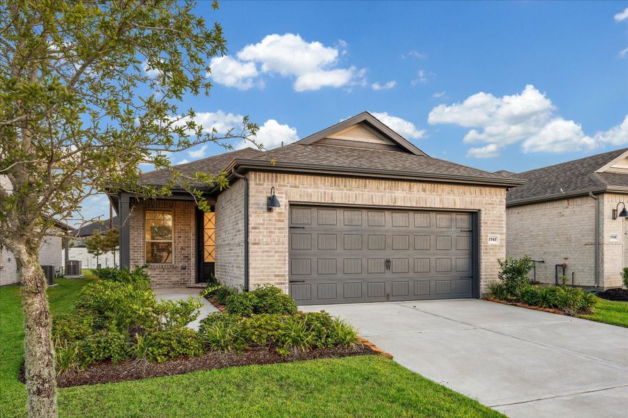 Front exterior of a new home in , Fulshear, TX, highlighting curb appeal (Image 1). Front exterior of a new home in , Fulshear, TX, highlighting curb appeal (Image 1).