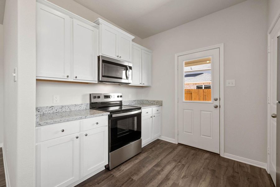 Furnished interior view inside a new home in Vacek Country Meadows, Richmond (Image 7).