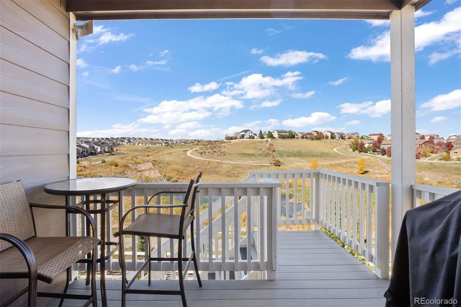 Upper deck walkout with open space views.