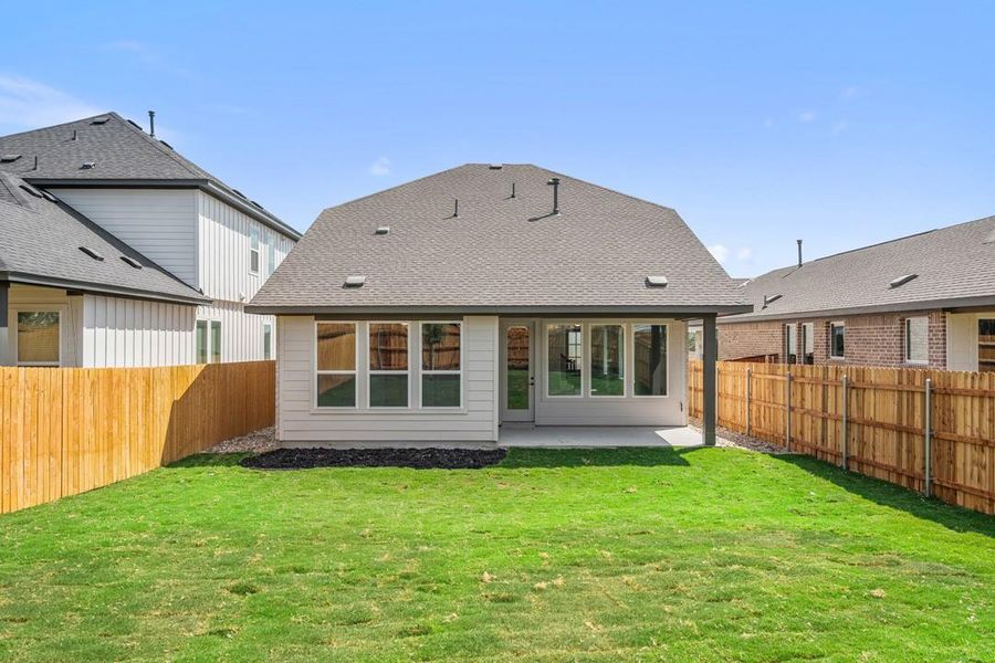 Exterior details and patio area of a home in Terrace Collection at Heritage, Dripping Springs (Image 19). Exterior details and patio area of a home in Terrace Collection at Heritage, Dripping Springs (Image 19).