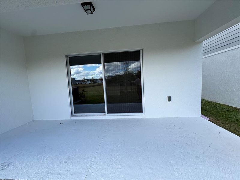 Exterior details and patio area of a home in Sky Lakes Towns, St. Cloud (Image 16).