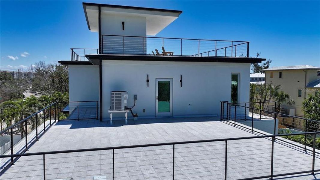 Exterior details and patio area of a home in , Sarasota (Image 29).