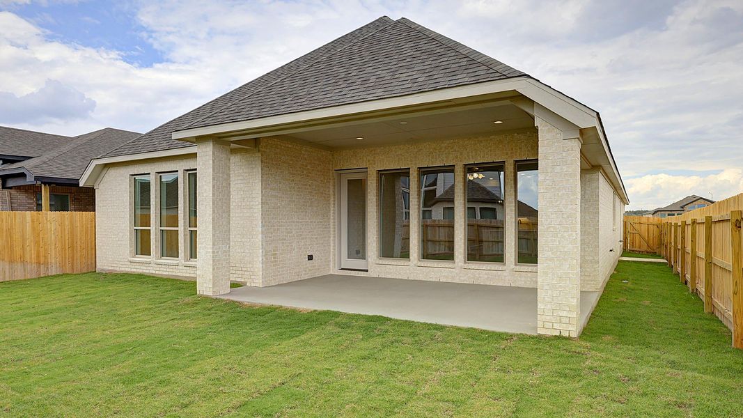 Exterior details and patio area of a home in Alsatian Oaks 50', Castroville (Image 20).