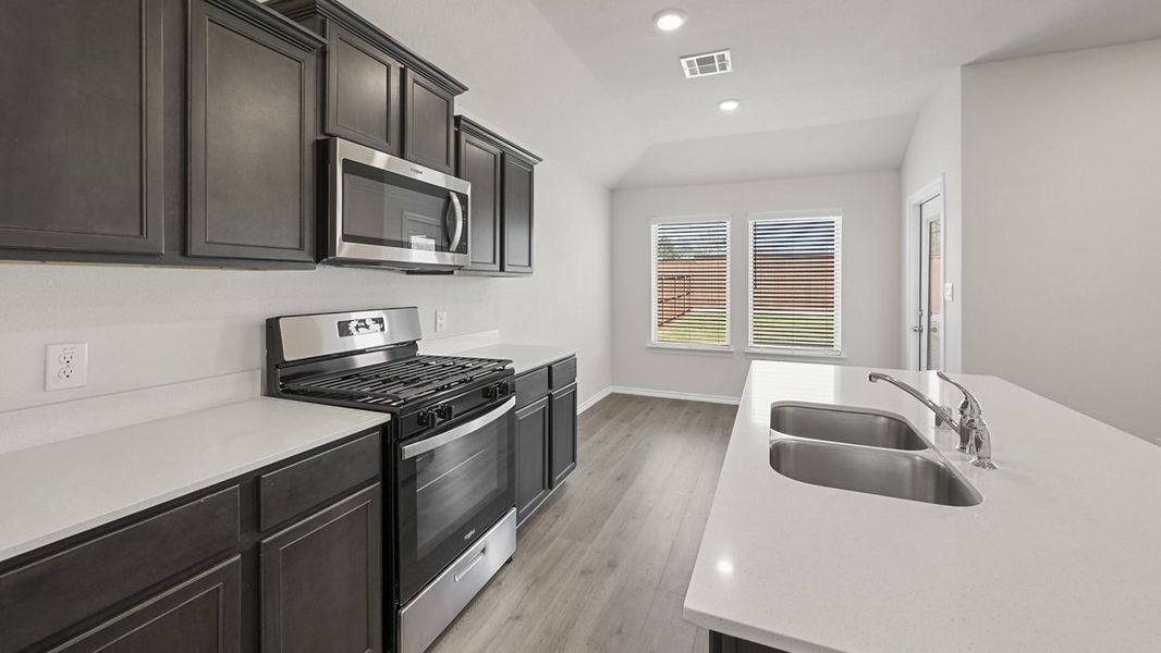 Representative furnished interior of a home built from the Zavalla by D.R. Horton in Blaire Lake, Tyler (Image 7).