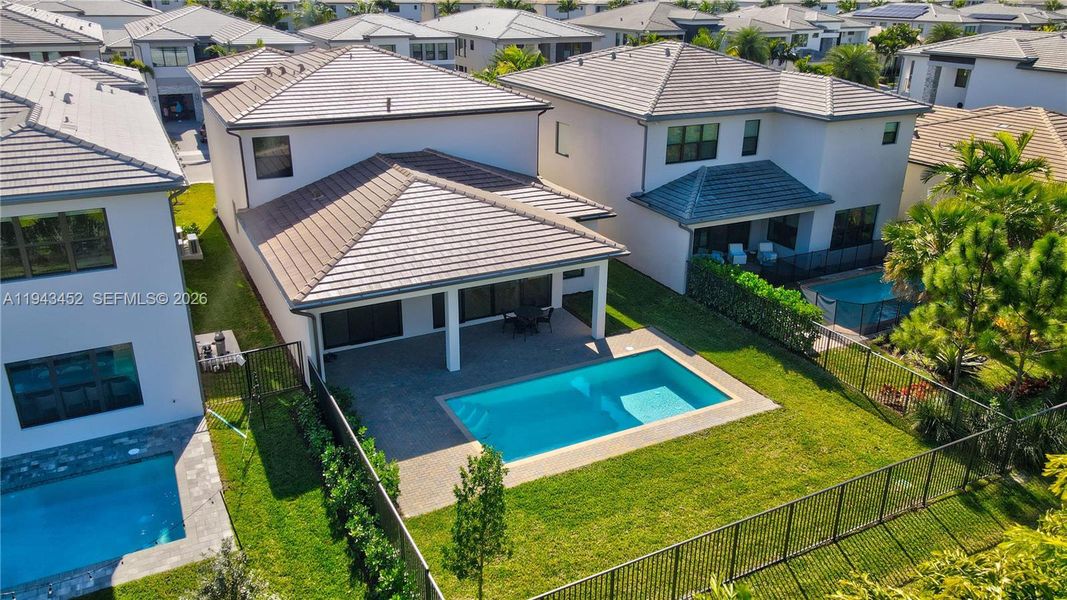Exterior details and patio area of a home in Lotus Edge, Boca Raton (Image 32).