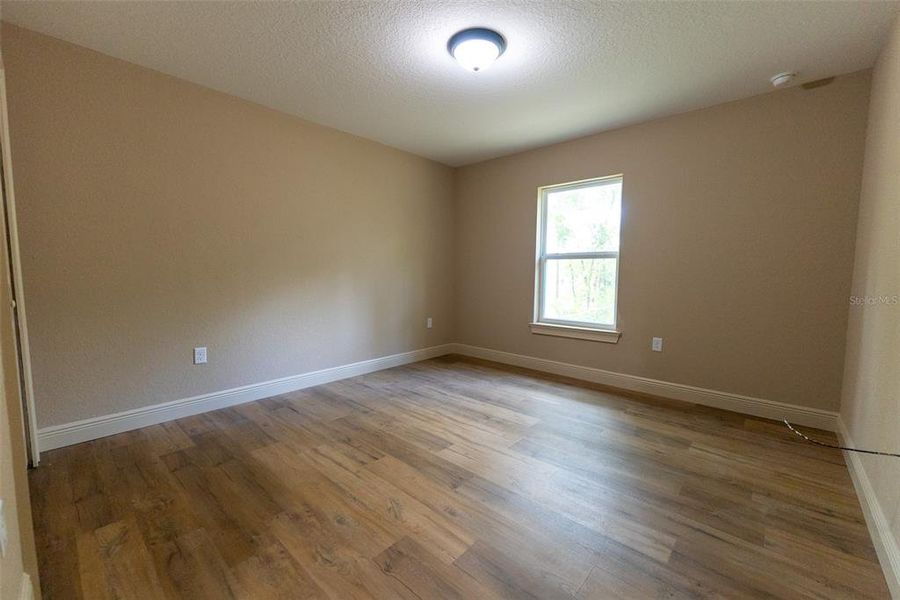 Spacious, unfurnished interior of a new home in Marion Oaks, Ocala (Image 11).