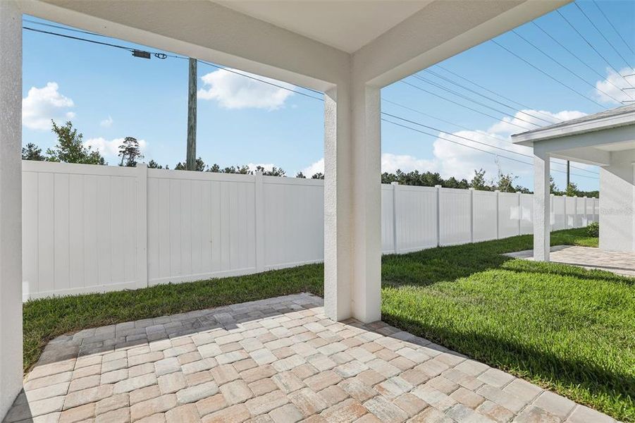 Exterior details and patio area of a home in Cyrene at Harmony, St. Cloud (Image 3). Exterior details and patio area of a home in Cyrene at Harmony, St. Cloud (Image 3).
