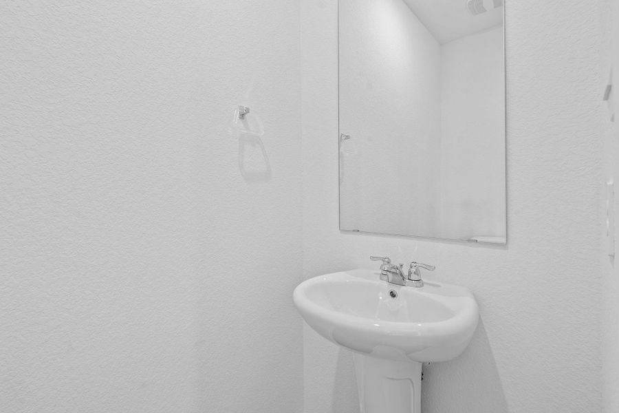 Bathroom with a textured wall Bathroom with a textured wall