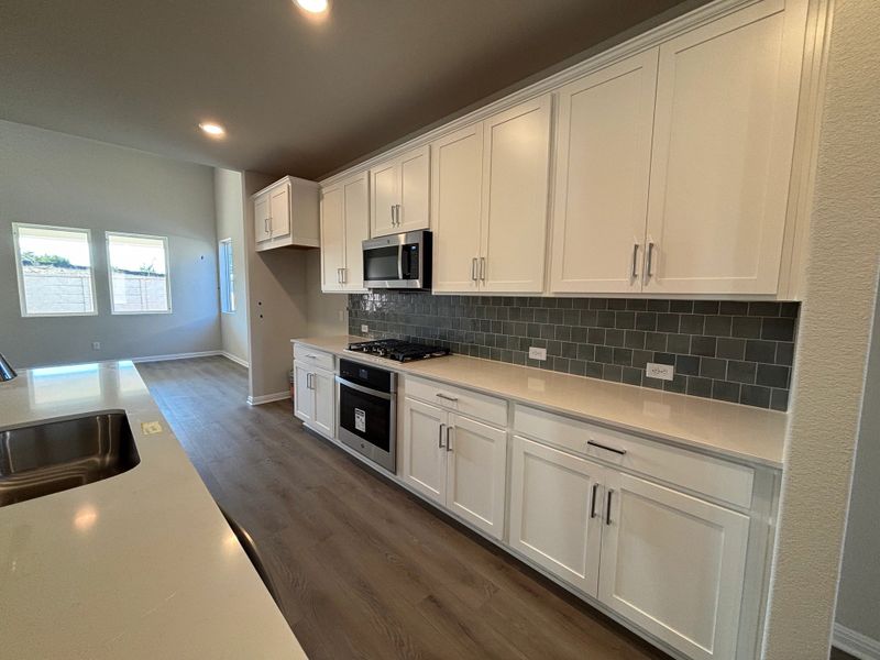 Furnished interior view inside a new home in Cannon Ranch 40s, Dripping Springs (Image 7).