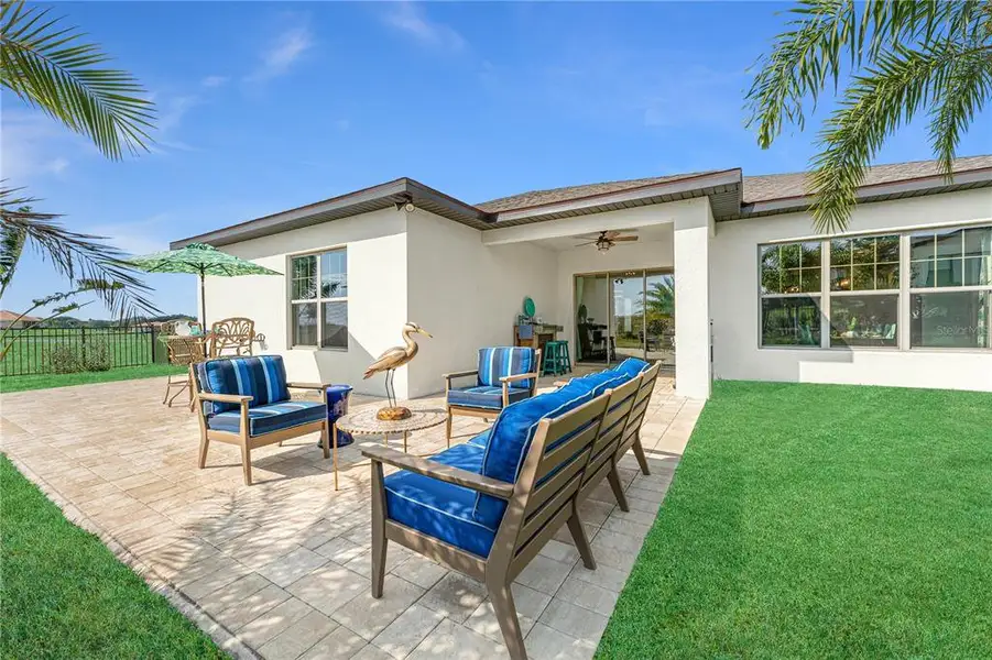 Exterior details and patio area of a home in , Auburndale (Image 3).