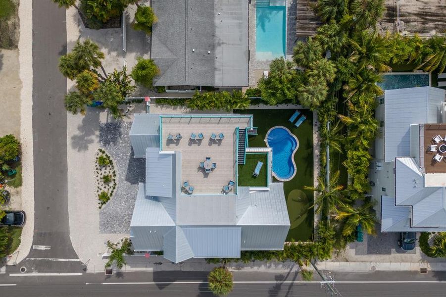 Front exterior of a new home in , Anna Maria, FL, highlighting curb appeal (Image 18).
