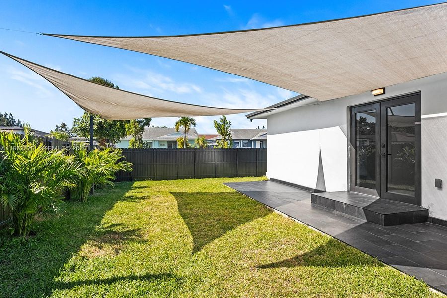 Exterior details and patio area of a home in , Miami (Image 27). Exterior details and patio area of a home in , Miami (Image 27).